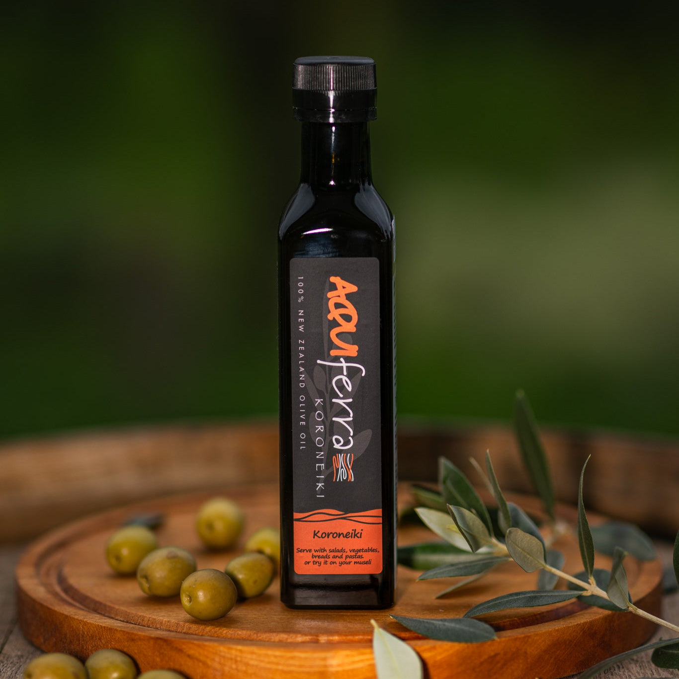 Aquiferra Koroneiki extra virgin olive oil bottle, medium intensity, herbaceous and fruity flavor.