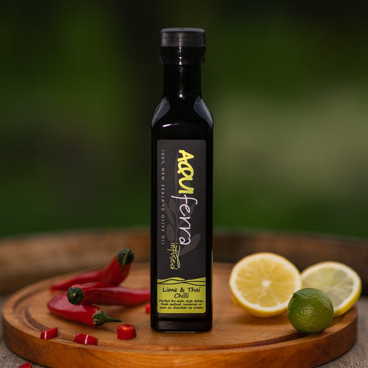 Aquiferra Lime & Thai Chilli olive oil bottle, with a zesty lime flavor and gentle spice, ideal for grilled meats, salads, pasta, rice, casseroles, and stir-fries.